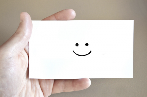 Notecard with a smiley face on it
