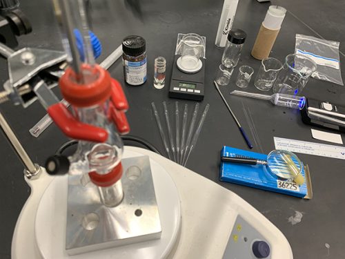Pictured above are most of the instruments, glassware and materials that will be used for at-home labs by Organic Chemistry I students in fall 2020.