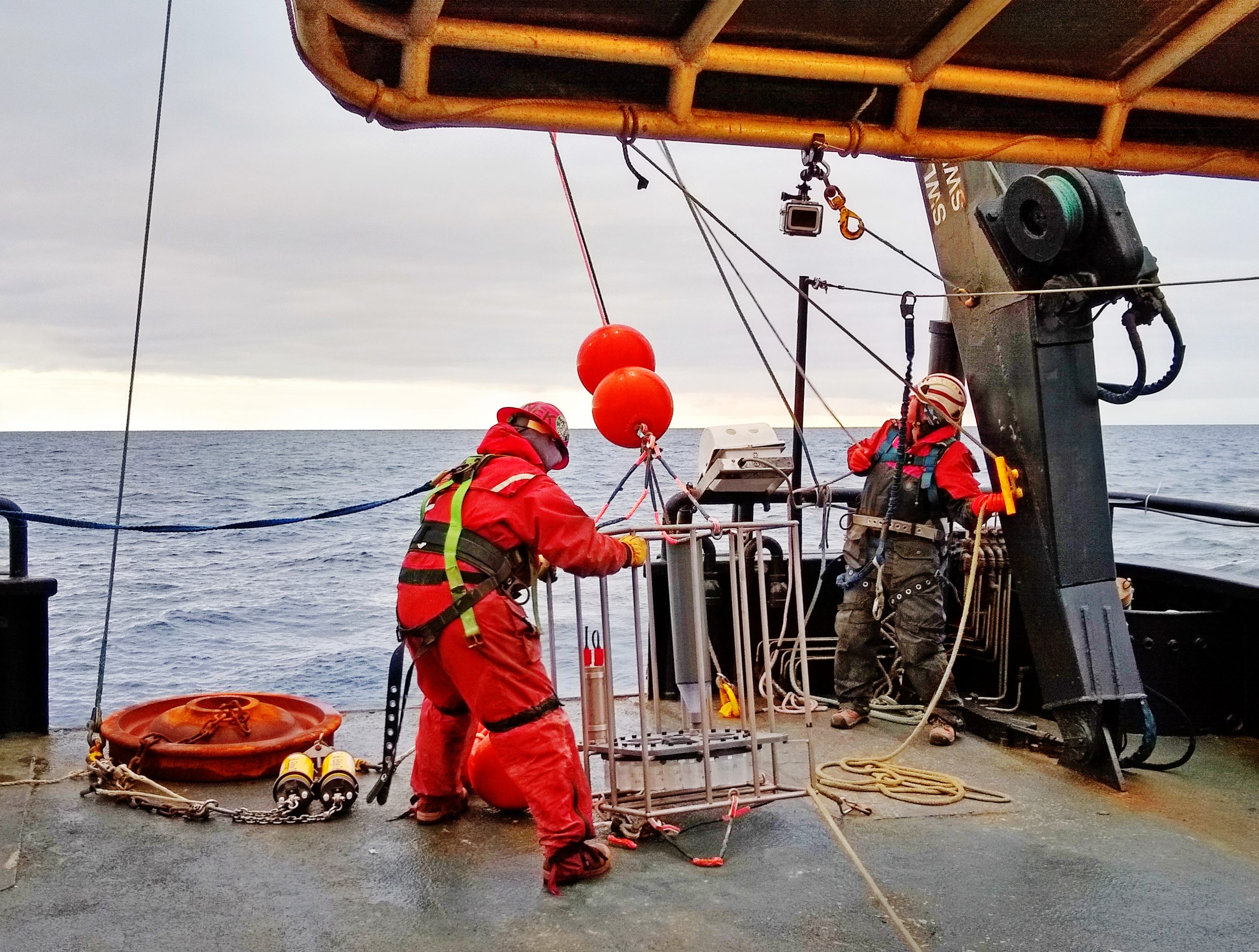 Photo by Savannah Sandy. Scientists deploy a mooring in the Chukchi Ecosystem Observatory from the Norseman II in October 2020. The mooring is equipped with a sediment trap and physical and biogeochemical sensors that will collect oceanographic data for one year.