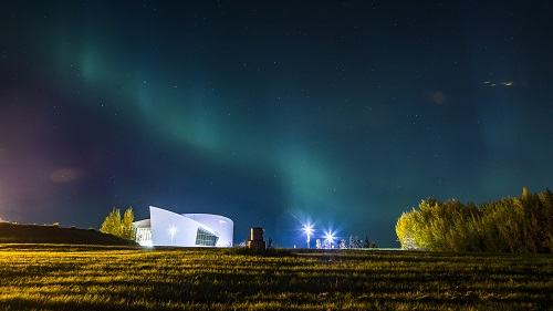 UAF photo by JR Ancheta. The aurora dances above the University of Alaska Museum of the North on a mid-September morning.