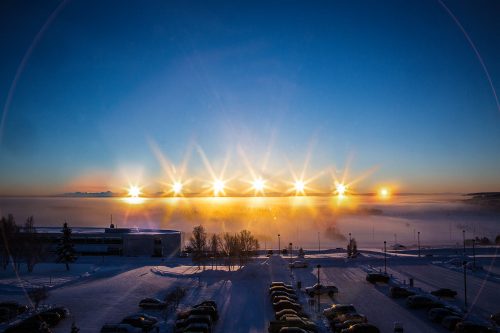 UAF photo by Todd Paris. A multiple-exposure photo of the winter-solstice sun arcing over the Alaska Range, taken from the University of Alaska Fairbanks campus on Dec. 21, 2012.