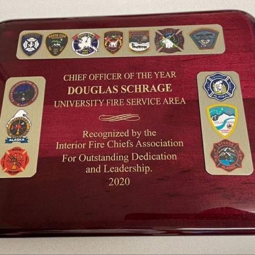 Plaque recognizing Doug Schrage as Interior fire chief officer of the year for 2020