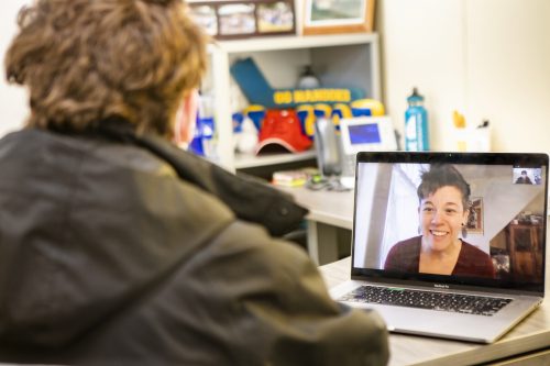 Ginny Kinne, director of the Academic Advising Center, offers virtual advising to a student in November 2020. UAF photo by JR Ancheta.