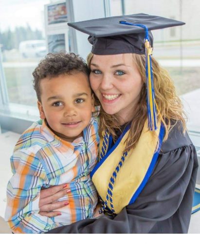 Photo courtesy of Michaella Perez. Perez holds her son, Zi, after graduating from UAF in 2015 with bachelors degree in interdisciplinary studies.