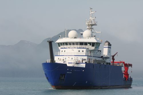 Photo by Sarah Spanos. The research vessel Sikuliaq returns to Seward from a cruise in the Northern Gulf of Alaska Long-Term Ecological Research area in July 2020.