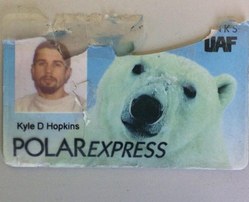 Photo courtesy of Kyle Hopkins. Kyle Hopkins still has his PolarExpress card from his student days at UAF, although it has suffered from use as a windshield ice scraper.