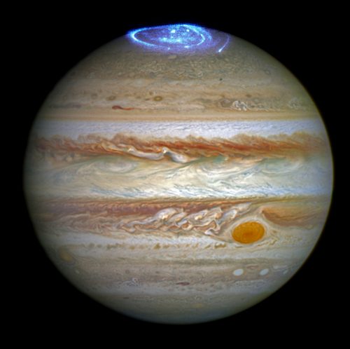 Photo courtesy of NASA. This 2016 image, a composite of two different Hubble observations, shows auroras photographed as NASA's Juno spacecraft approaches and enters into orbit around Jupiter.