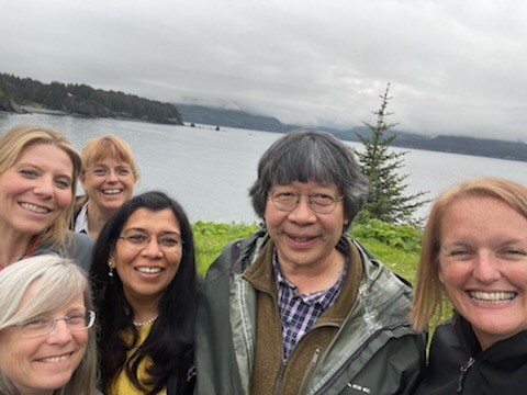 Ginny Eckert (lower left), Julie Queen (upper left), Nettie La Belle-Hamer (back), Anupma Prakash (second from left), Quentin Fong (second from right) and Kellie Fritze far right) gathered at the Kodiak Seafood and Marine Science Center in June 2021. Photo courtesy of Julie Queen.