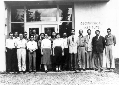 Photo courtesy of the Geophysical Institute. Geophysical Institute employees gather in 1958 in front of the Chapman Building, which originally housed the institute. The then-director, C.T. Elvey, is third from the right.