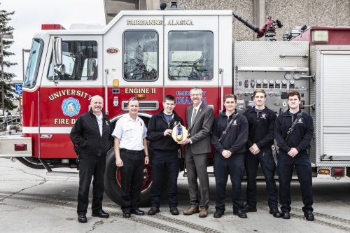 The University Fire Department's Heart Walk team won the first week's Blue and Gold Shoe as part of the 2019 Heart Walk fundraising efforts. UAF photo by JR Ancheta.
