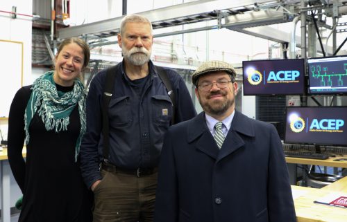 Michael McEleney, right, toured ACEP’s PSI Lab with ARENA coordinator Carolyn Loeffler and ACEP Energy Technology Facility manager David Light. McEleney visited the Fairbanks campus in November 2019 for the Arctic Command Alaska Symposium. Photo by Amanda Byrd.