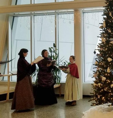 The Coventry Carolers perform in the lobby of the UA Museum of the North. Photo courtesy of the museum.