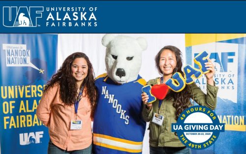 Webpage screen shot of two students posing with a Nanook mascot in front of UAF-branded signs. Includes graphic of UA Giving Day.