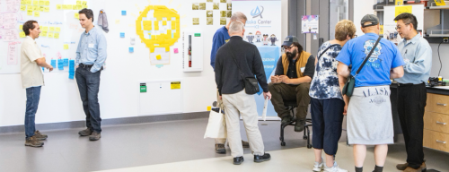Faculty and staff talk with UAF alumni in the UA Center ICE makerspace on the Troth Yeddha' campus during Nanook Rendezvous in July 2019. UAF photo by JR Ancheta.