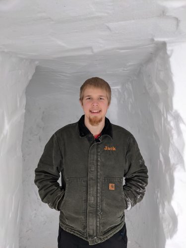 Jack McCaslin is an ACEP utility student intern working on a solar project in Hughes, Alaska. Photo courtesy of Jack McCaslin.