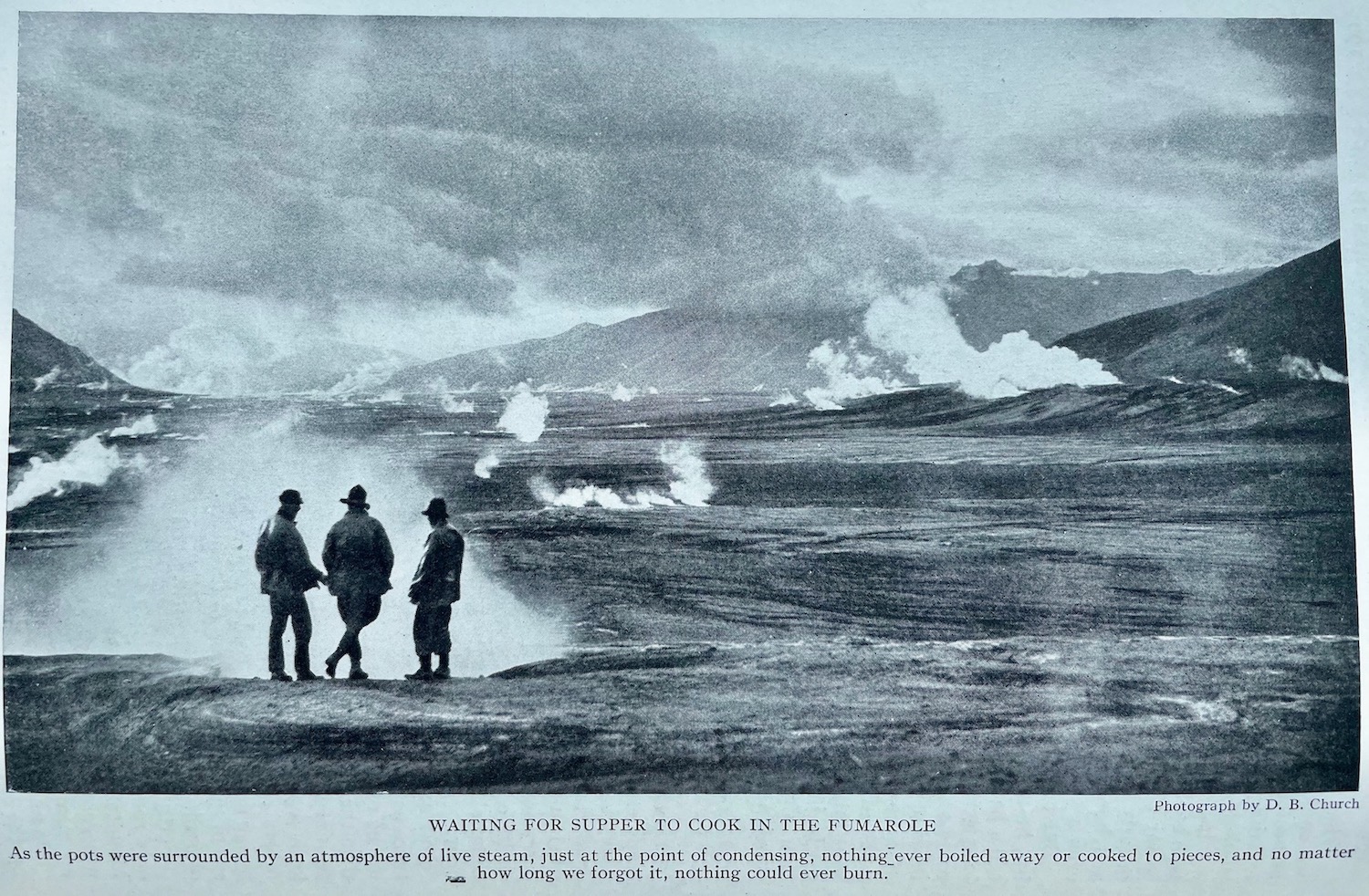 Men stand on a barren valley studded with wispy steam from ground vents.