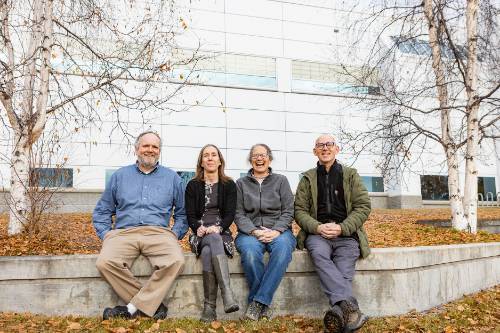 UAF Researchers. From left, Chris Maio, Sarah Fowell, Nancy Bigelow and Matthew Wooller gather by the Reichardt Building on the Fairbanks campus. UAF photo by JR Ancheta 