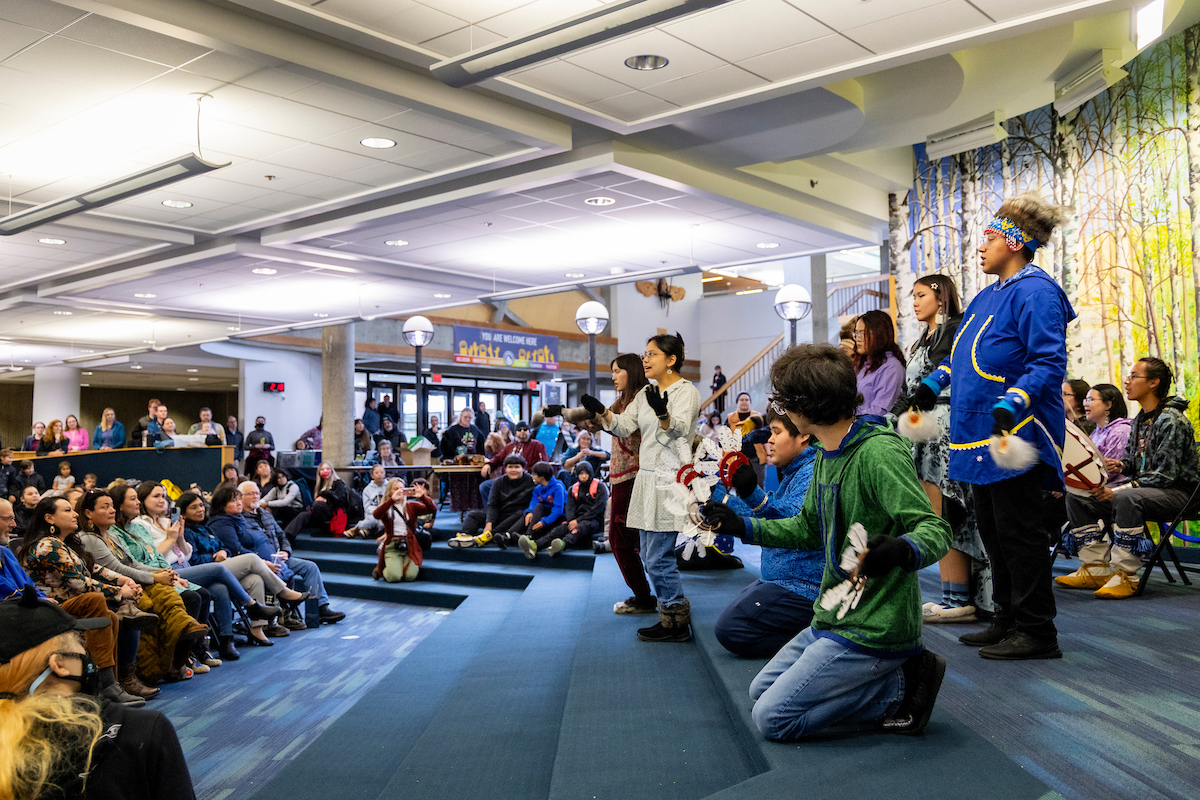 Members of the Iñu-Yupiaq Dance Group share a cultural dance with attendees in the multilevel lounge area of the UAF Wood Center during the 2023 Indigenous Peoples Day Celebration on Oct. 9, 2023.