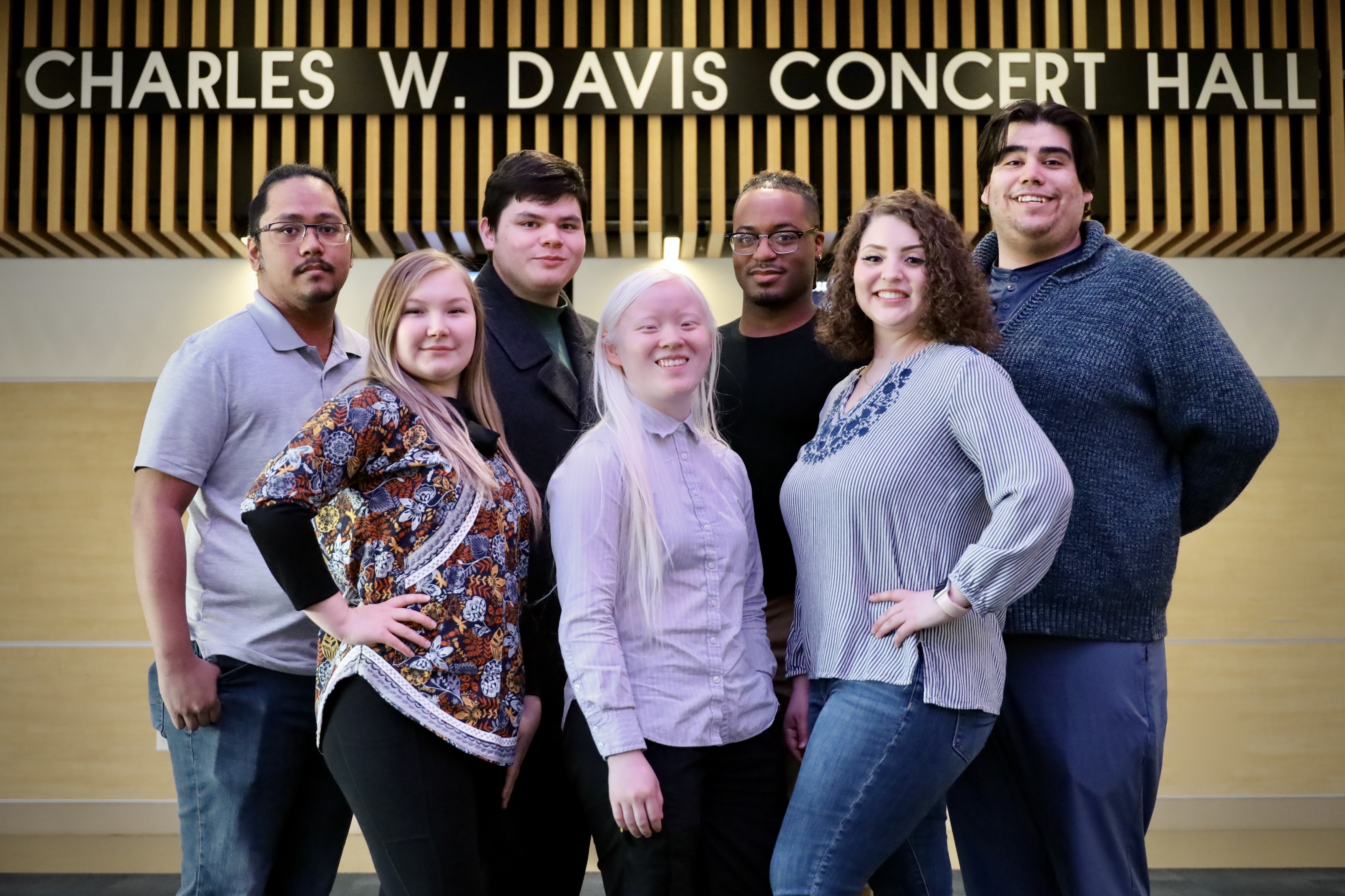 Music Department students stand in front of the Davis Concert Hall. UAF Music Photo by Jaunelle Celaire.