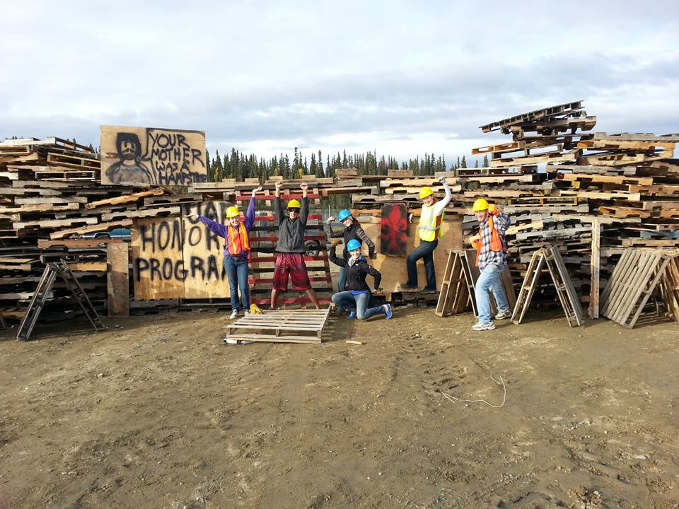 Students with wooden pallets at Starvation Gulch. Photo by Logan Elliott.