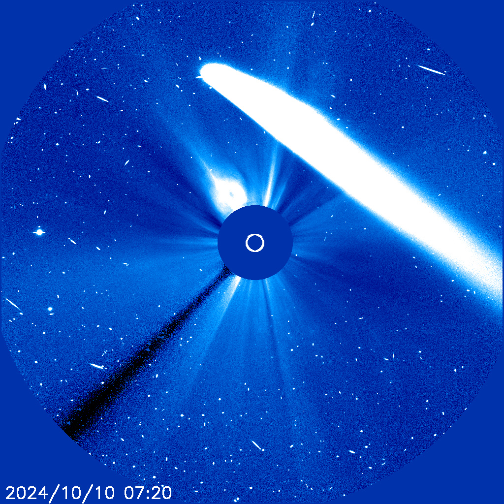 NASA image of comet passing near sun.