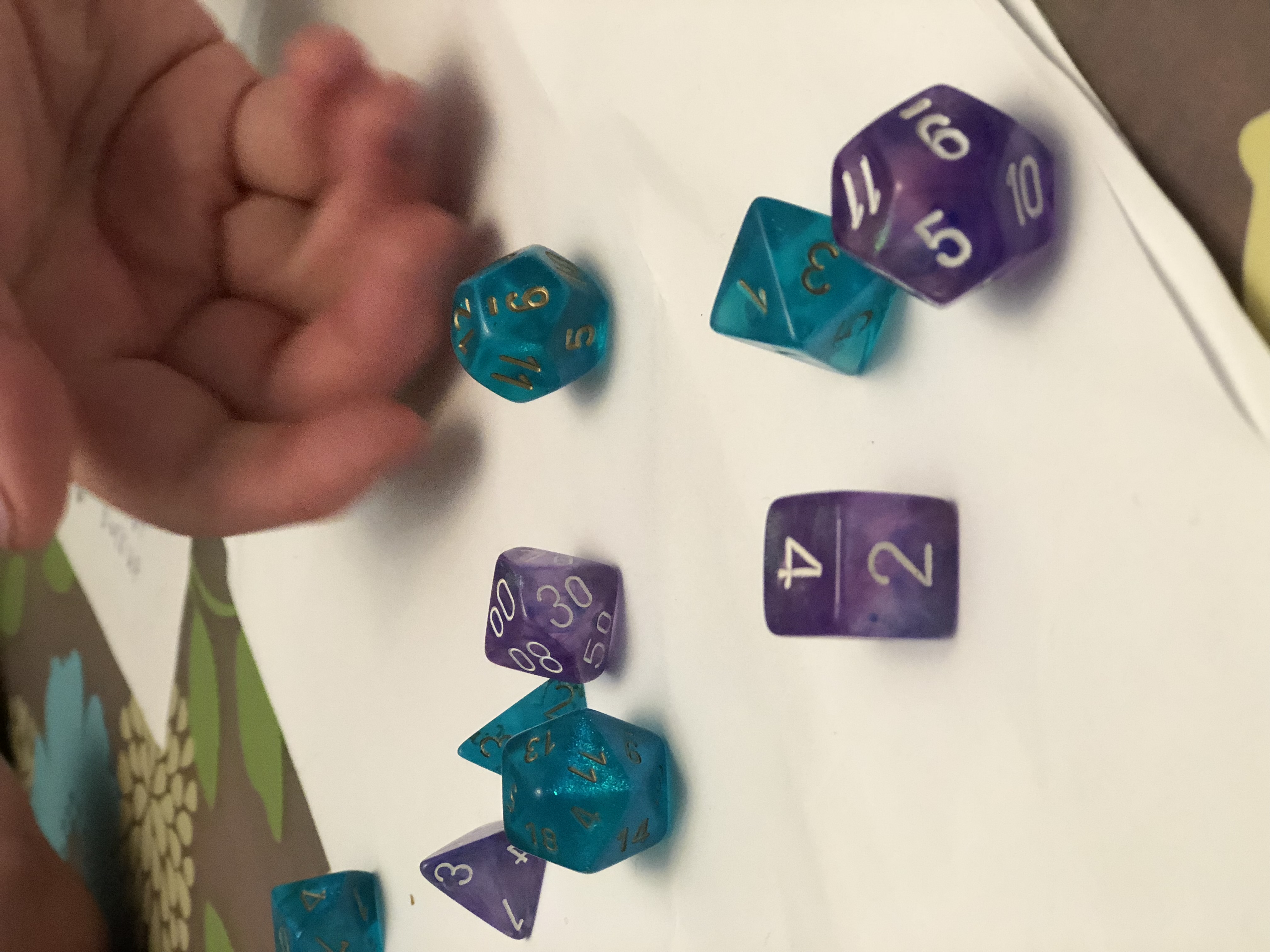 Rolling dice for a tabletop role-playing game.