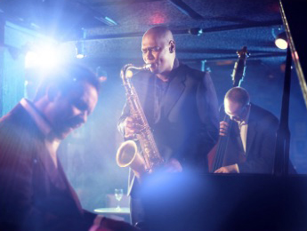 A jazz ensemble plays music on stage