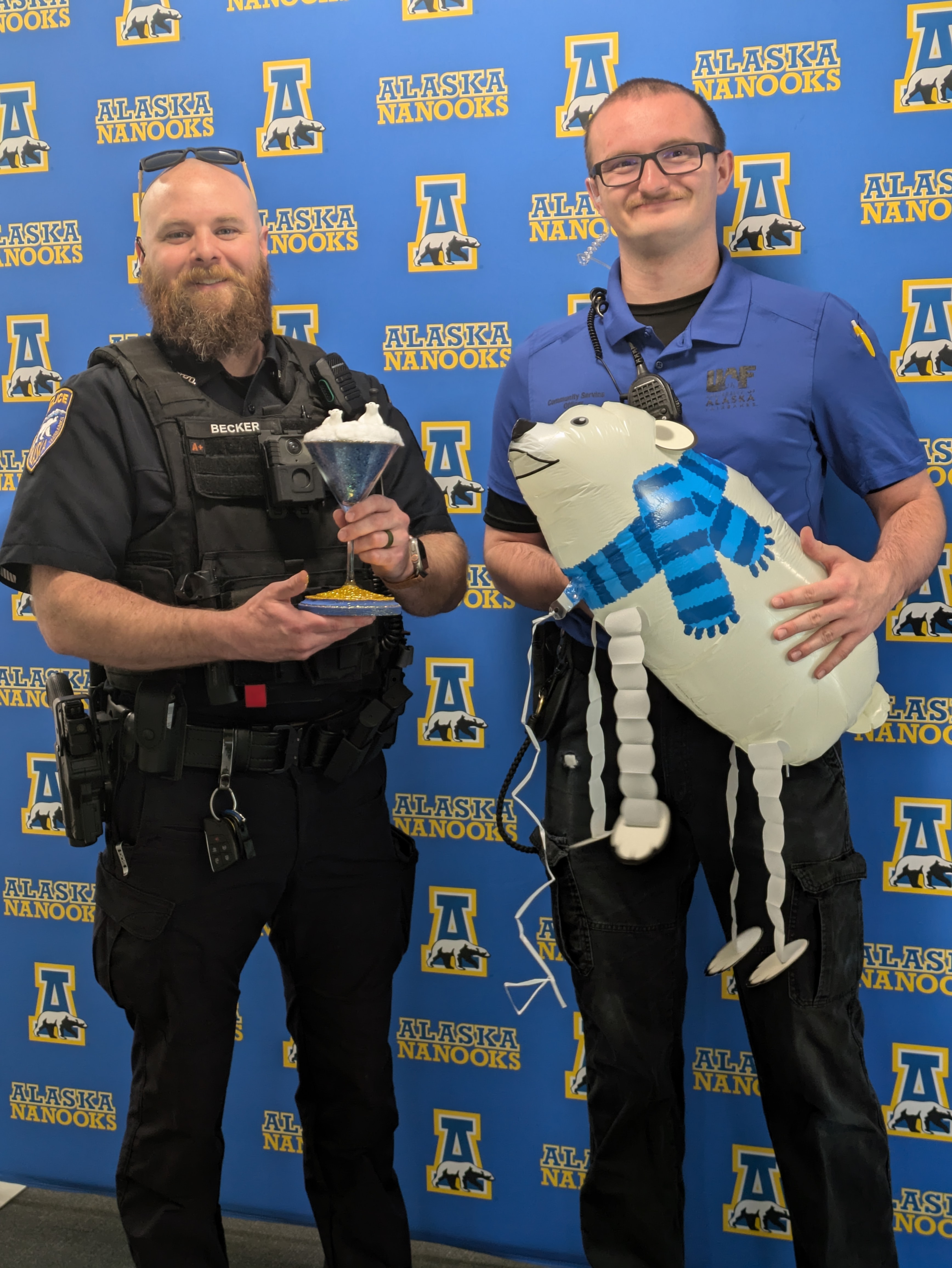 University Police Department accepting their Mocktail Mixology Trophy.