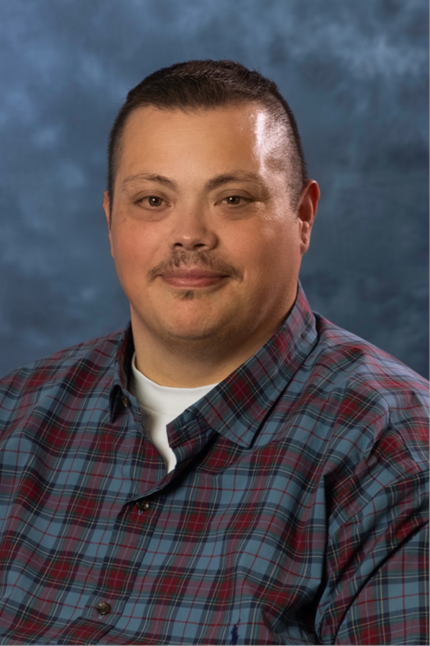 Headshot photo of Ryan Cortez, the new associate director of Military and Veteran Services.