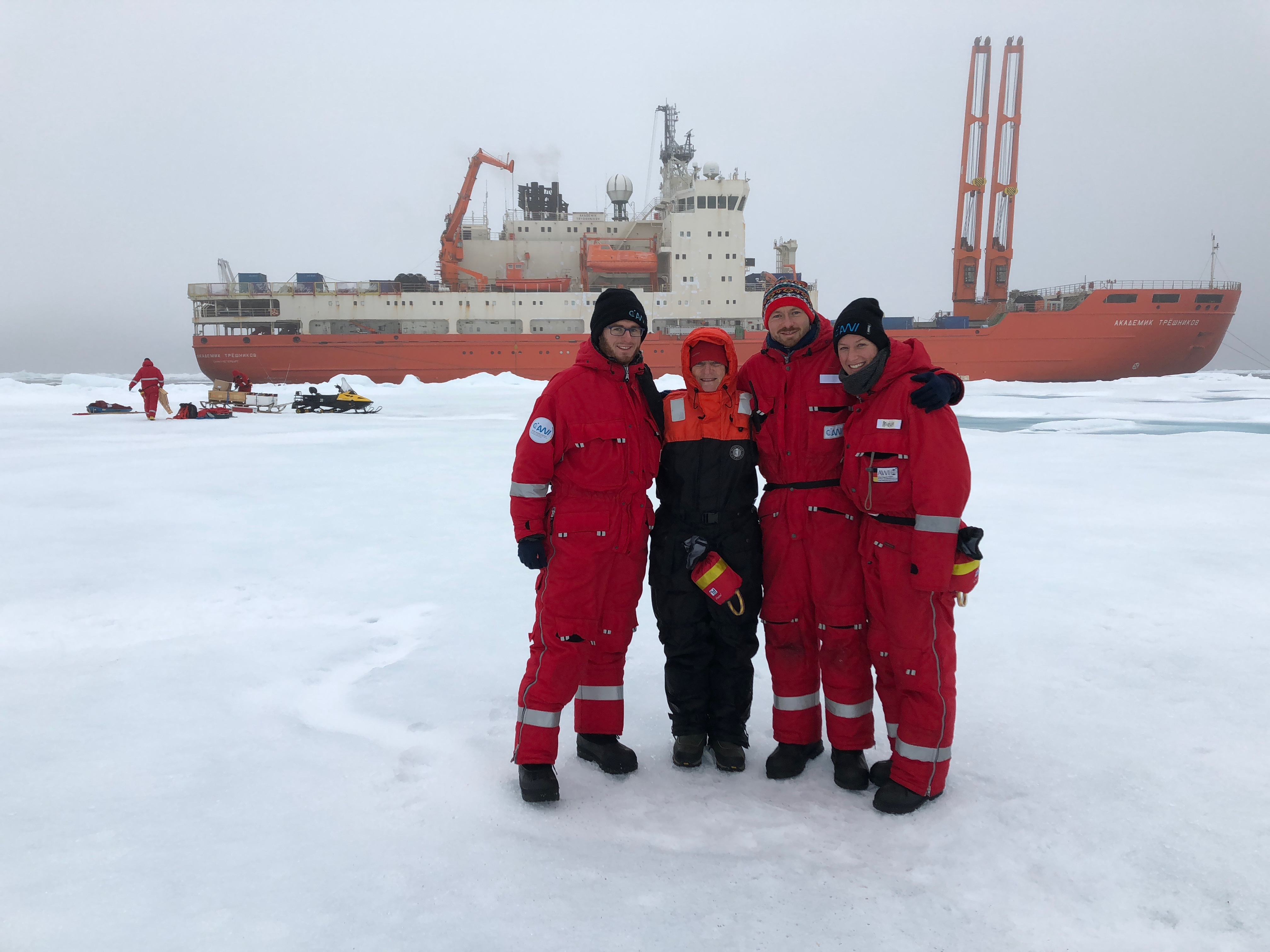 NABOS participants pose on the sea ice in front of the research vessel Akademik Tryoshnikov during the 2018 expedition to the eastern Arctic Ocean. Photo by Vladimir Bogdanov.