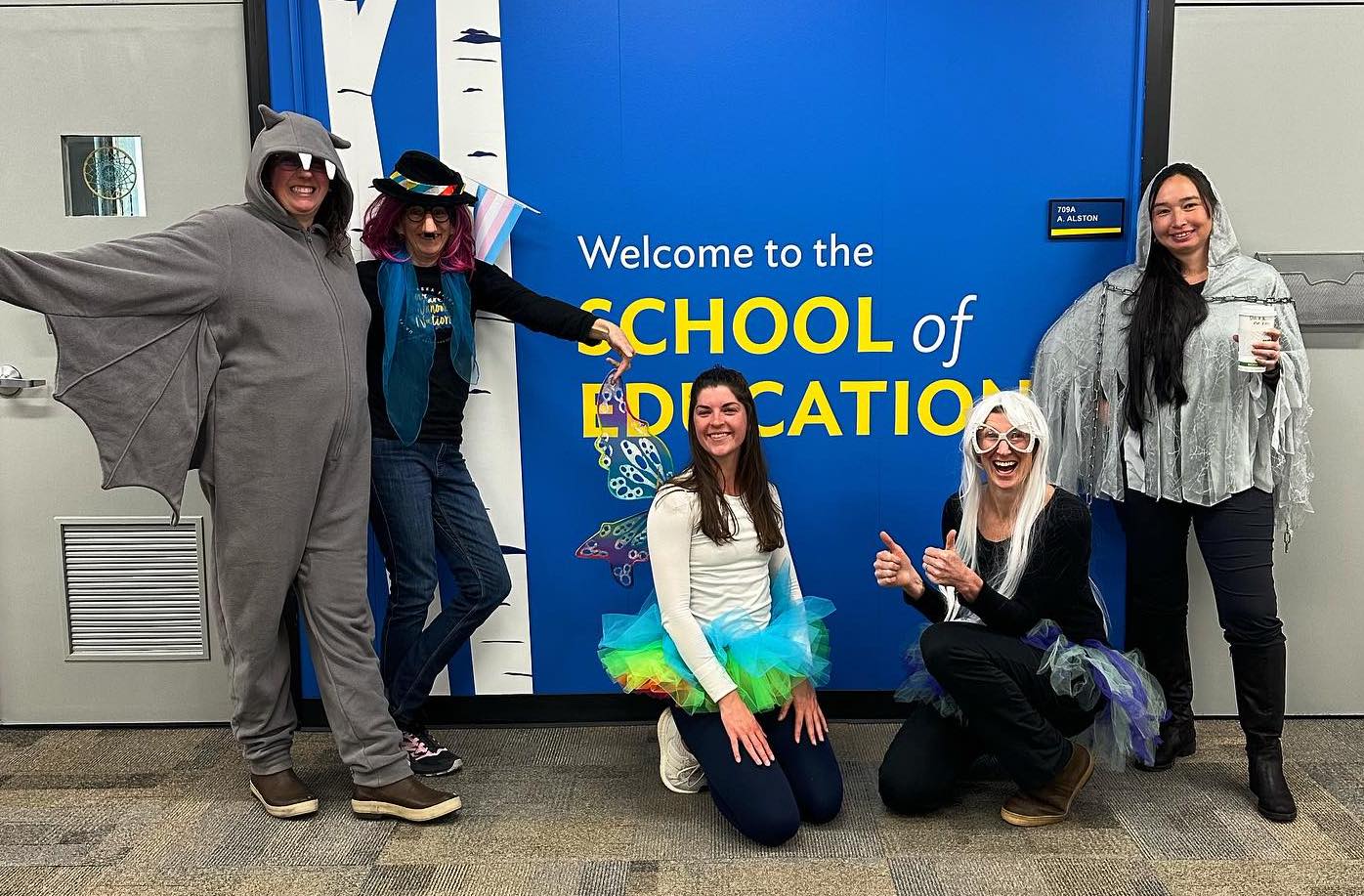 School of Education faculty and staff in costume from last Halloween.