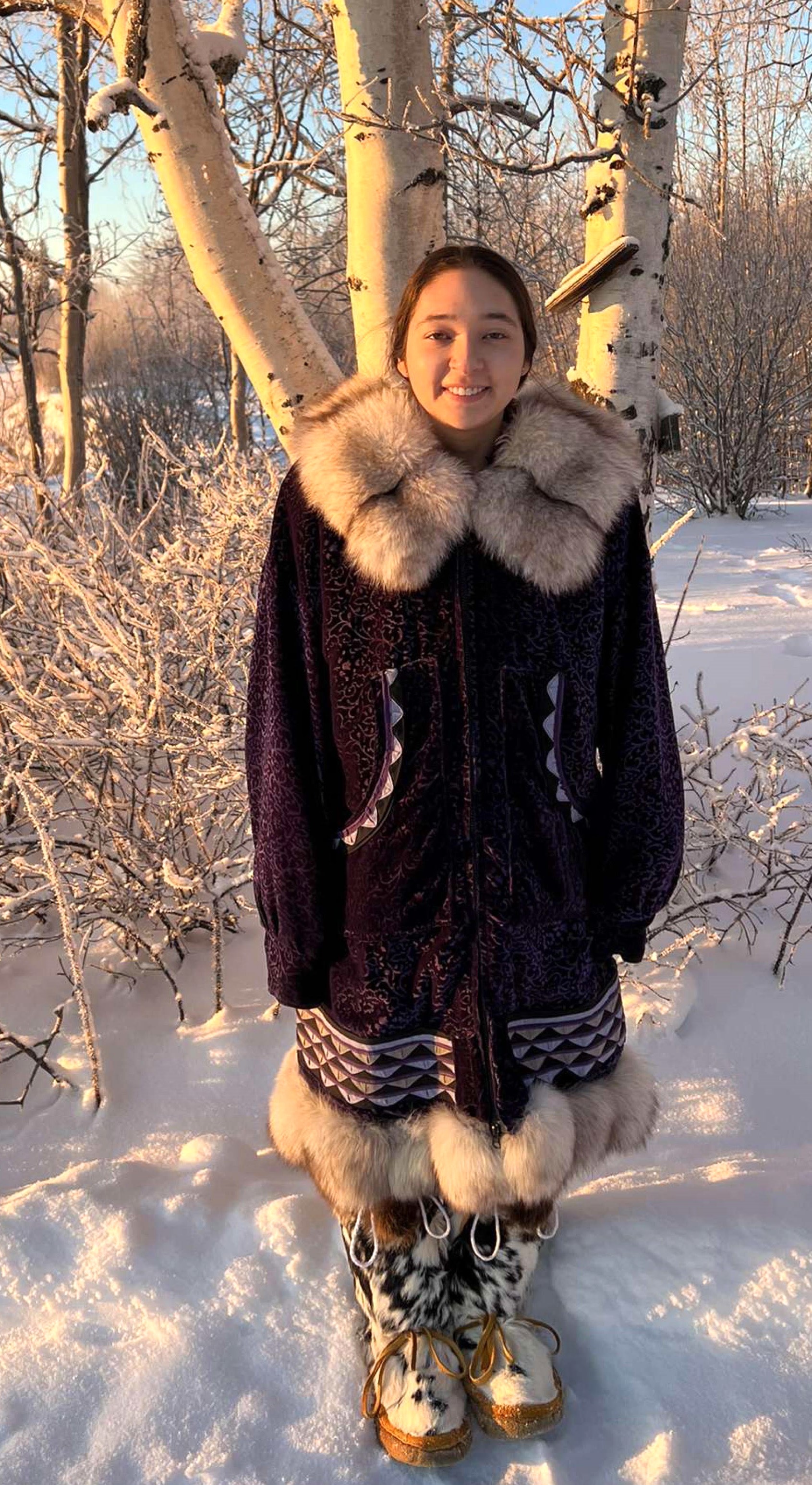 BLaST Scholar Tirzah Bryant in her traditional parka and fur boots