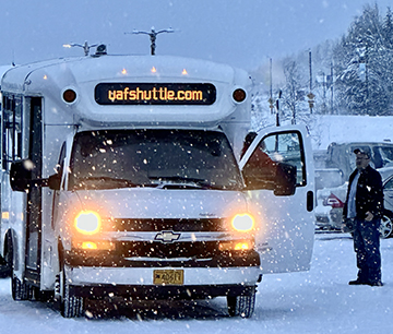 The UAF shuttle makes a stop on the Troth Yeddha' campus in Fairbanks to pick up and drop off passengers.