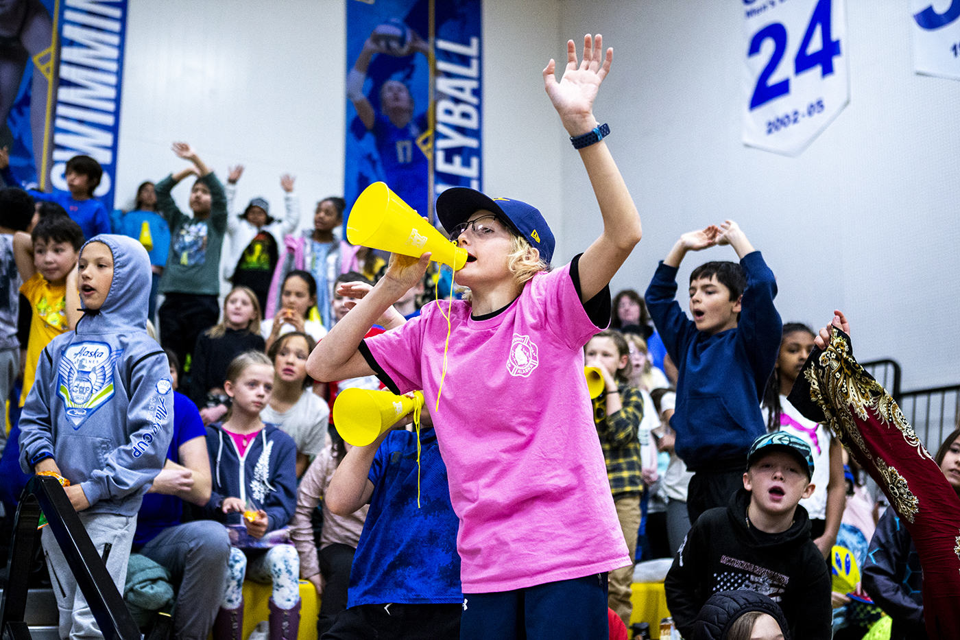 A UAF fan celebrates at a Pink Out game.