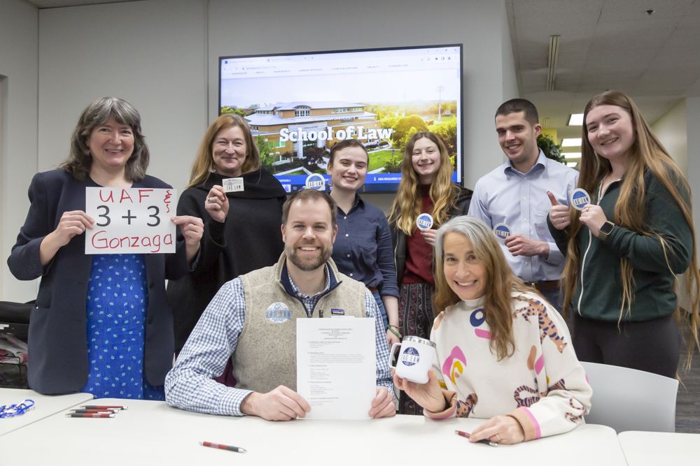 Photo by Sarah Manriquez Pre-Law Club officers and members with Faculty Carol Gray, Dean Ellen Lopez pose at the signing ceremony for the MOU about the UAF / Gonzaga 3+3 program with Luke Cairney, the Director of Admissions from Gonzaga University School of Law.