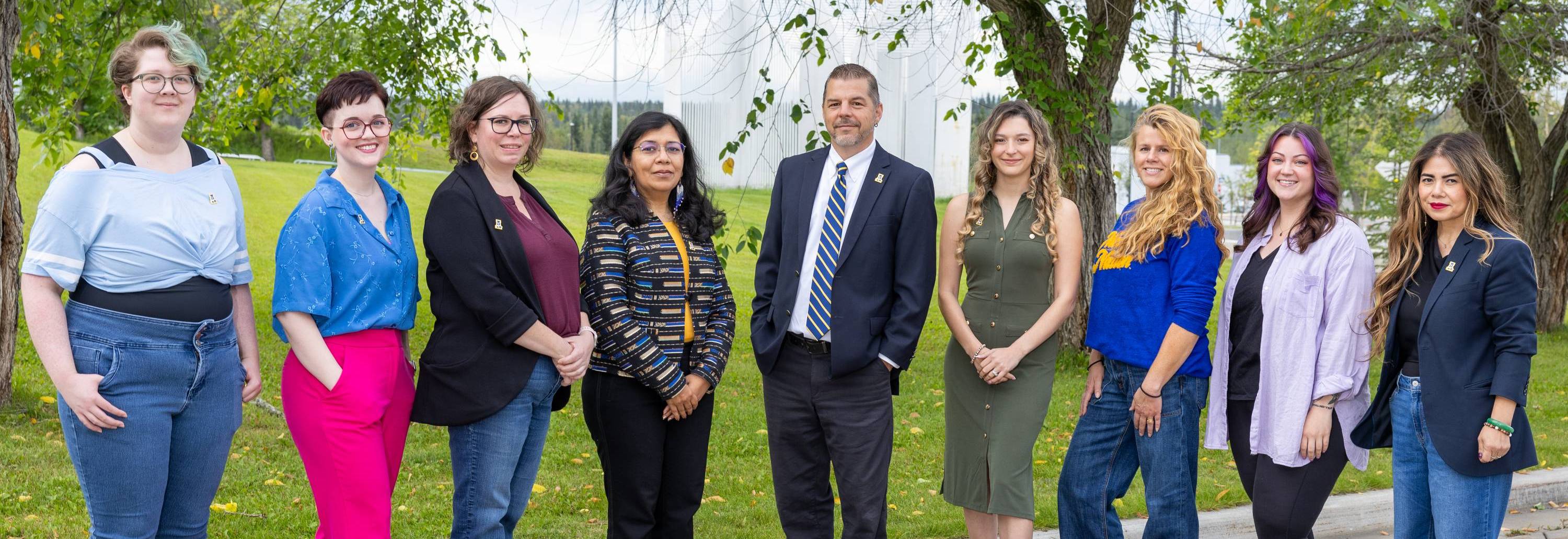 Provost office group picture with Anupma Prakash, Trent Sutton, Rochelle Rodak, Jennifer Hoppough, Jennifer Tilbury, Libby MacDonald, Victoria Dropps, Sarah Thomas, and Rey Young. 