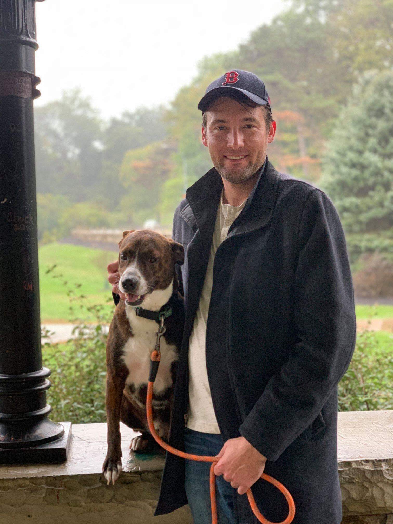 Professor Chris Miller and his dog, Devo.