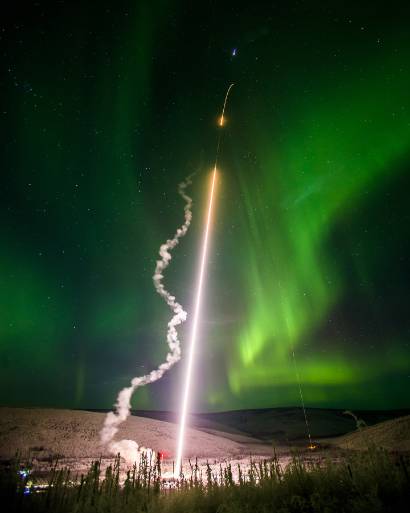 A rocket taking off into the aurora from Poker Flat Research Range.