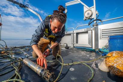 Hannah Myers collects her hydrophones after they've been sitting on the ocean floor recording Killer Whale calls for the last 12 months. She can use the calls to identify different pods of whales.