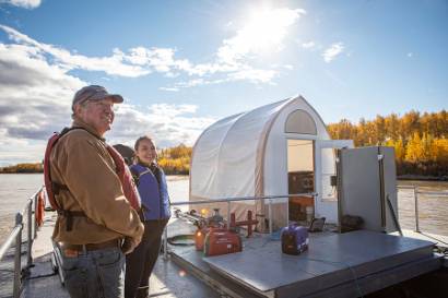 Members of the Alaska Center for Power and Energy aboard the Tanana River Research Barge in Nenana.