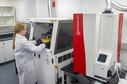 A Research technician analyzes samples in the Institute of Northern Engineering's Critical Minerals Lab at UAF