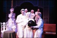 Cast members on stage during the production of 