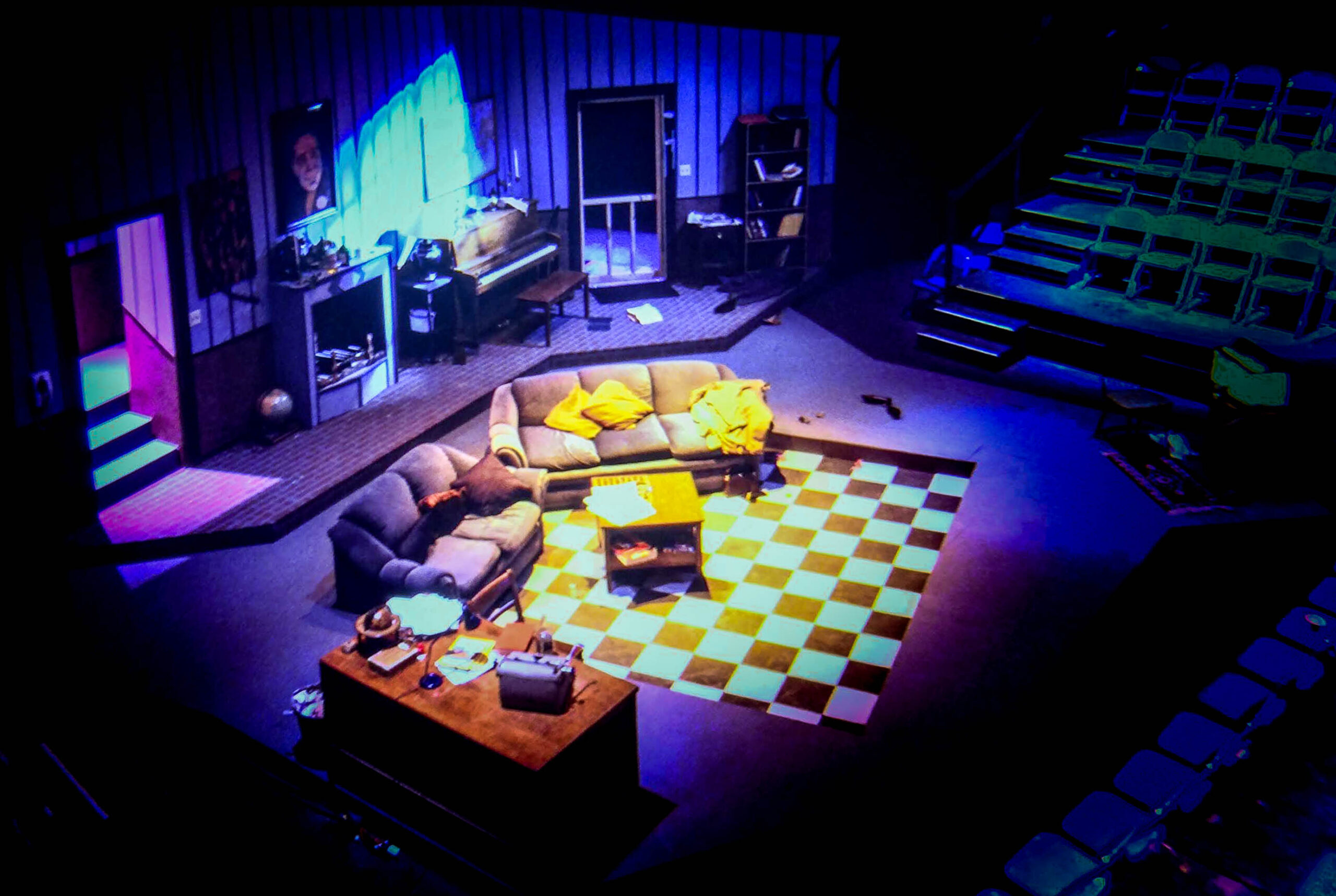 Living room scene with checkered floor on stage