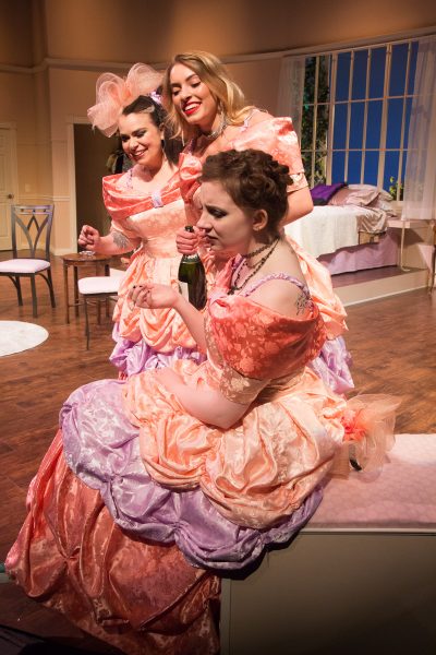 An image from the production of 'Five Women Wearing the Same Dress' featuring Jill Shipman, Meghan Fowler, Sarah Williams.