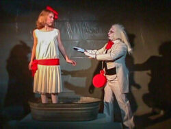 Alice and the white rabbit on stage