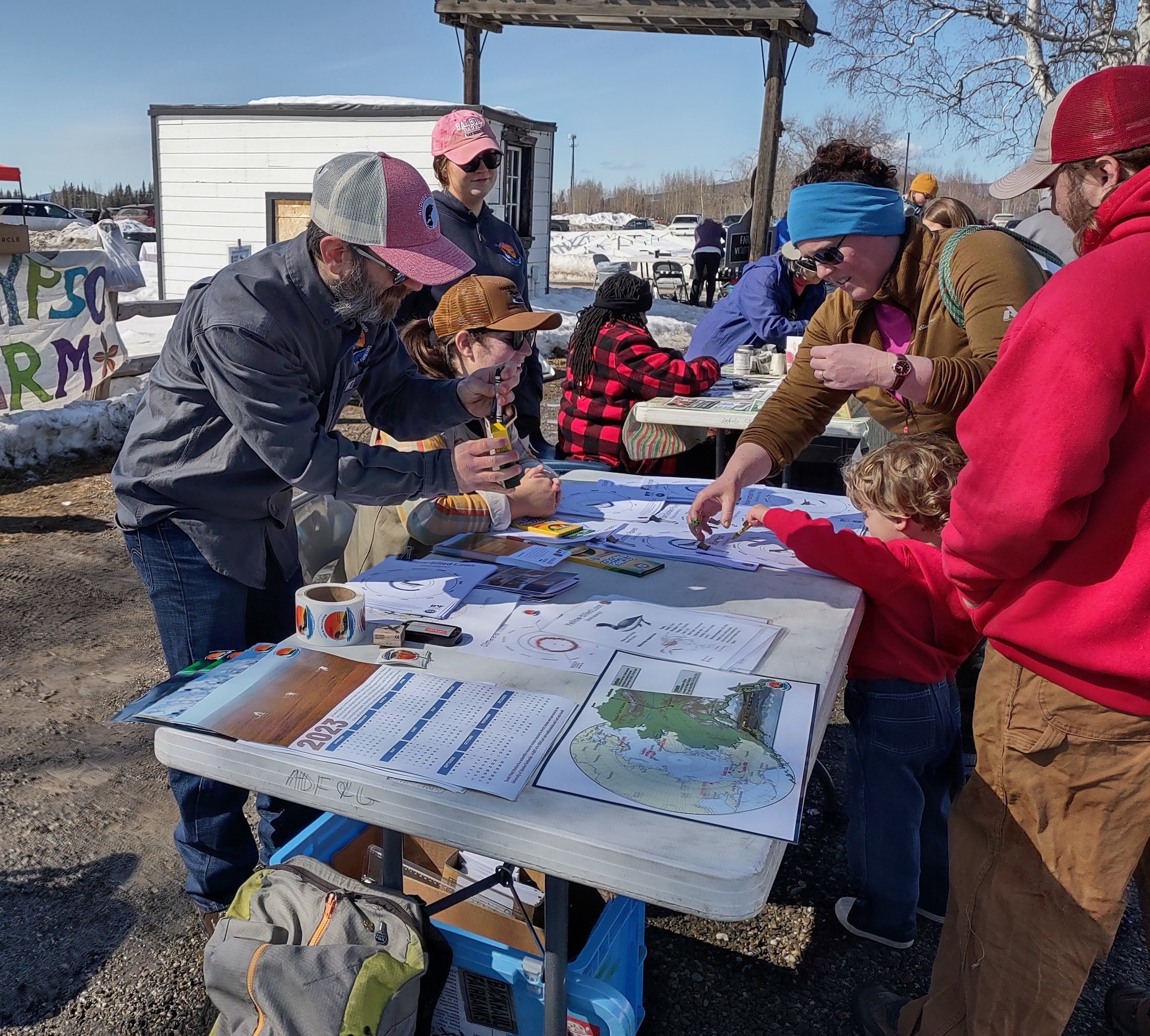 Photo by Amanda Young/Toolik Field Station.
Toolik Field Station friend David Watts and staff members Kara Kornhauser and Rowan McPherson talk about the seasonal cycles of migratory birds with over 700 Fairbanks community members at the Friends of Creamer's Field Spring Migration Celebration.