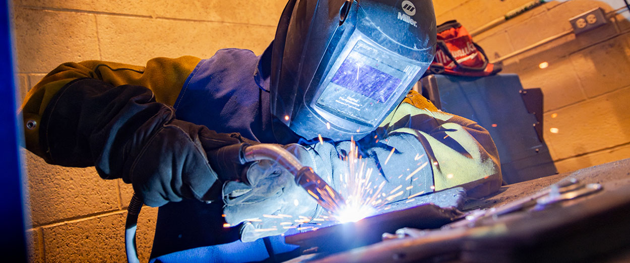 A student welder at UAF Community and Technical College
