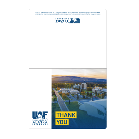 Notecard that reads, thank you, with Fairbanks campus West Ridge photo background