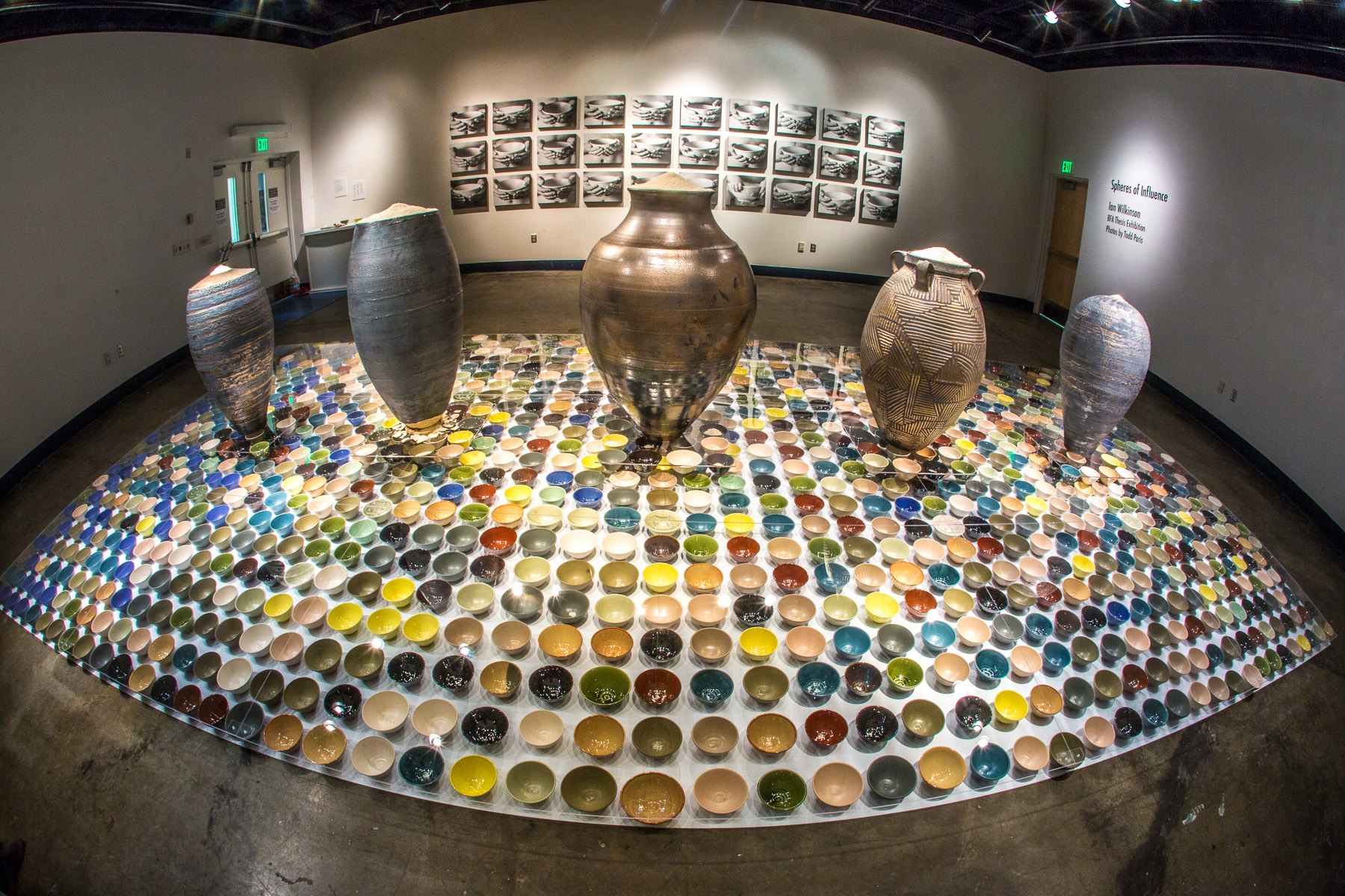 spheres of influence exhibit featuring clay bowls filling an entire room