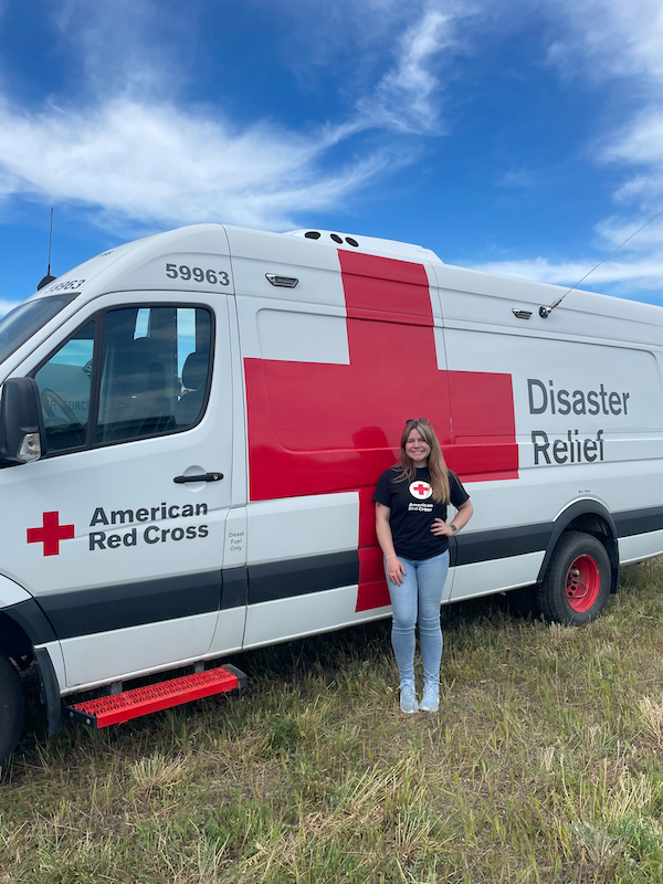 Grace in front of the Red Cross Van.